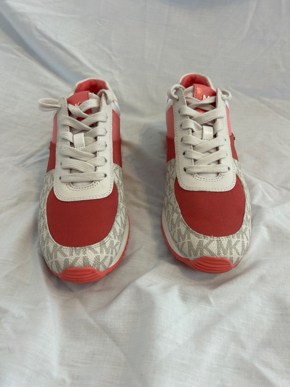 Michael Kors Women’s Coral Pink and White Logo Sneakers